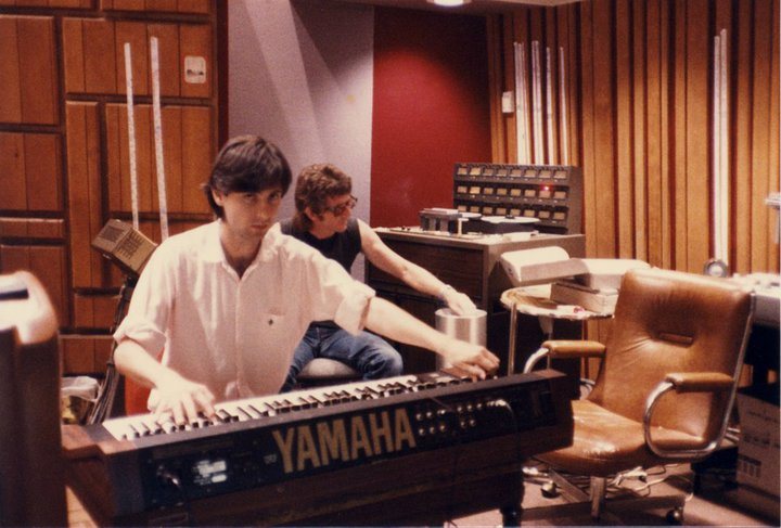 Coleman at a Yamaha keyboard in a wood-paneled 1980s recording studio
